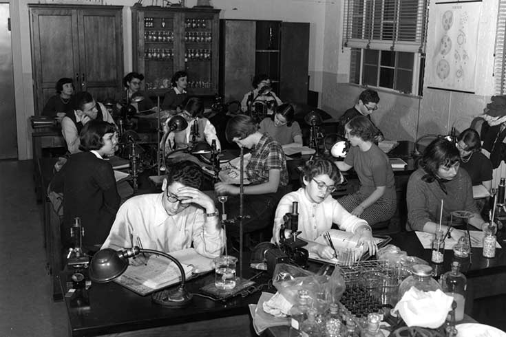 Black and white photo of students in a biology lab