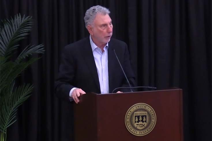 Marty Baron standing at a podium