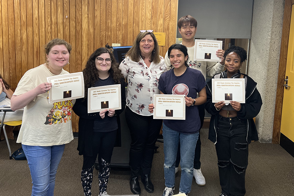 group of students in Paola Servino's ITAL 20 class with their honorable mention certificates from the 2023 Brandeis Language Oscars