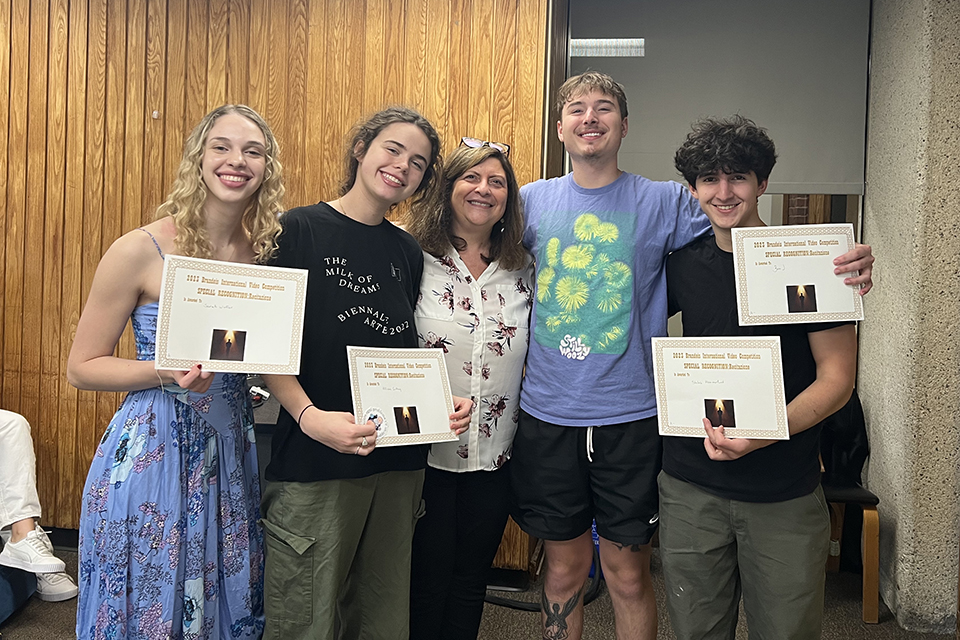 group of students in Paola Servino's ITAL 20 class with their honorable mention certificates from the 2023 Brandeis Language Oscars