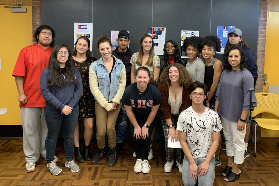 photo of students at Latinx Theatre Poster Exhibit