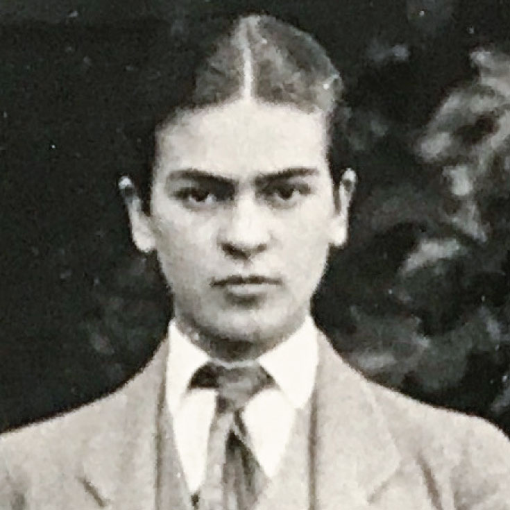 Family portrait of the Kahlo family, with Frida Kahlo in the middle dressed in men's clothes.