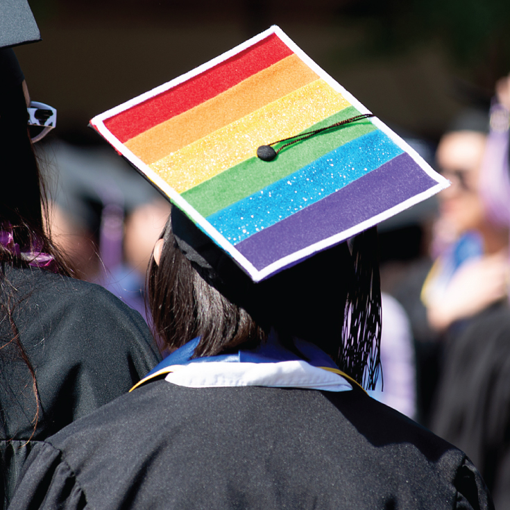 Student wearing a rainbow graduation cap