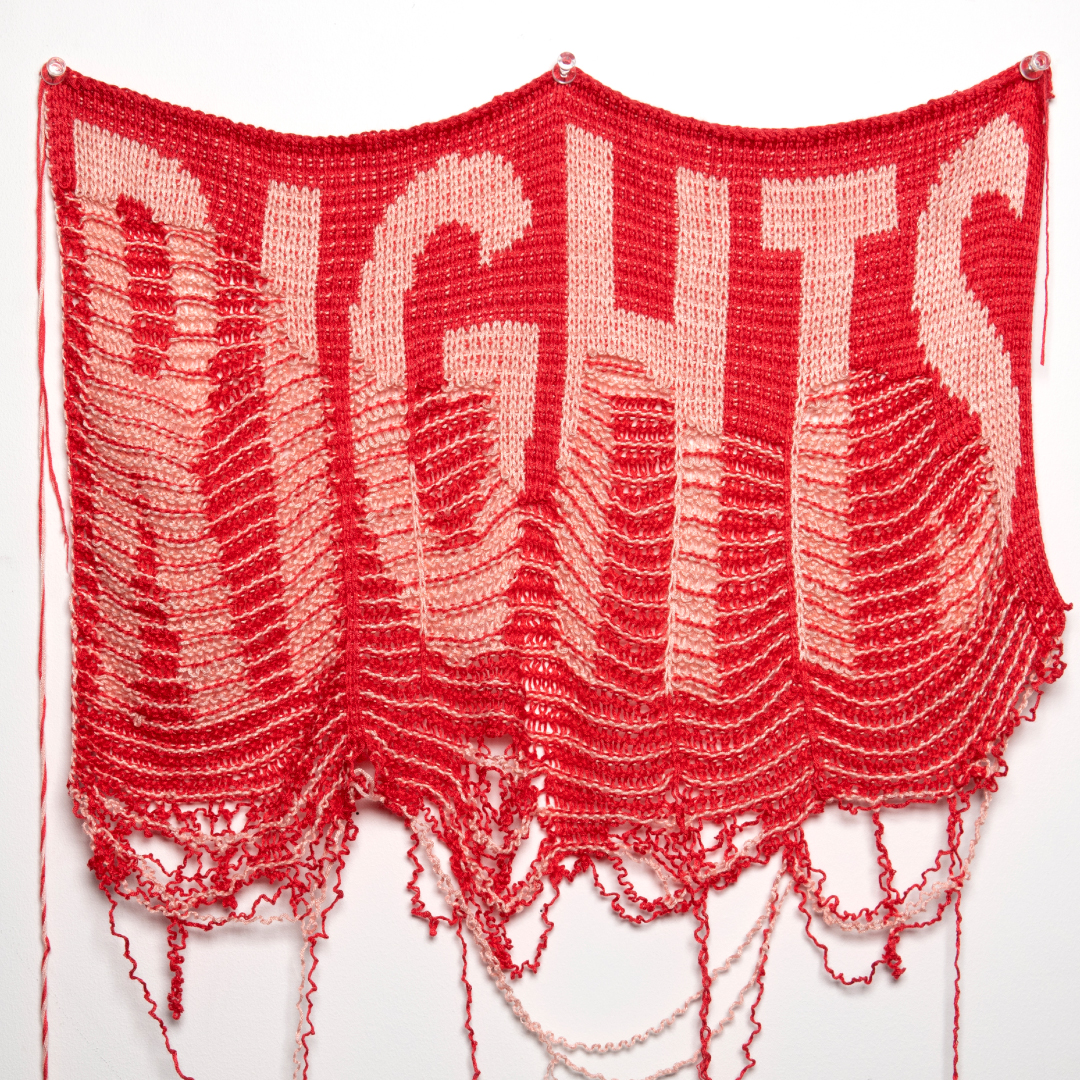 Knitted sign that says Right