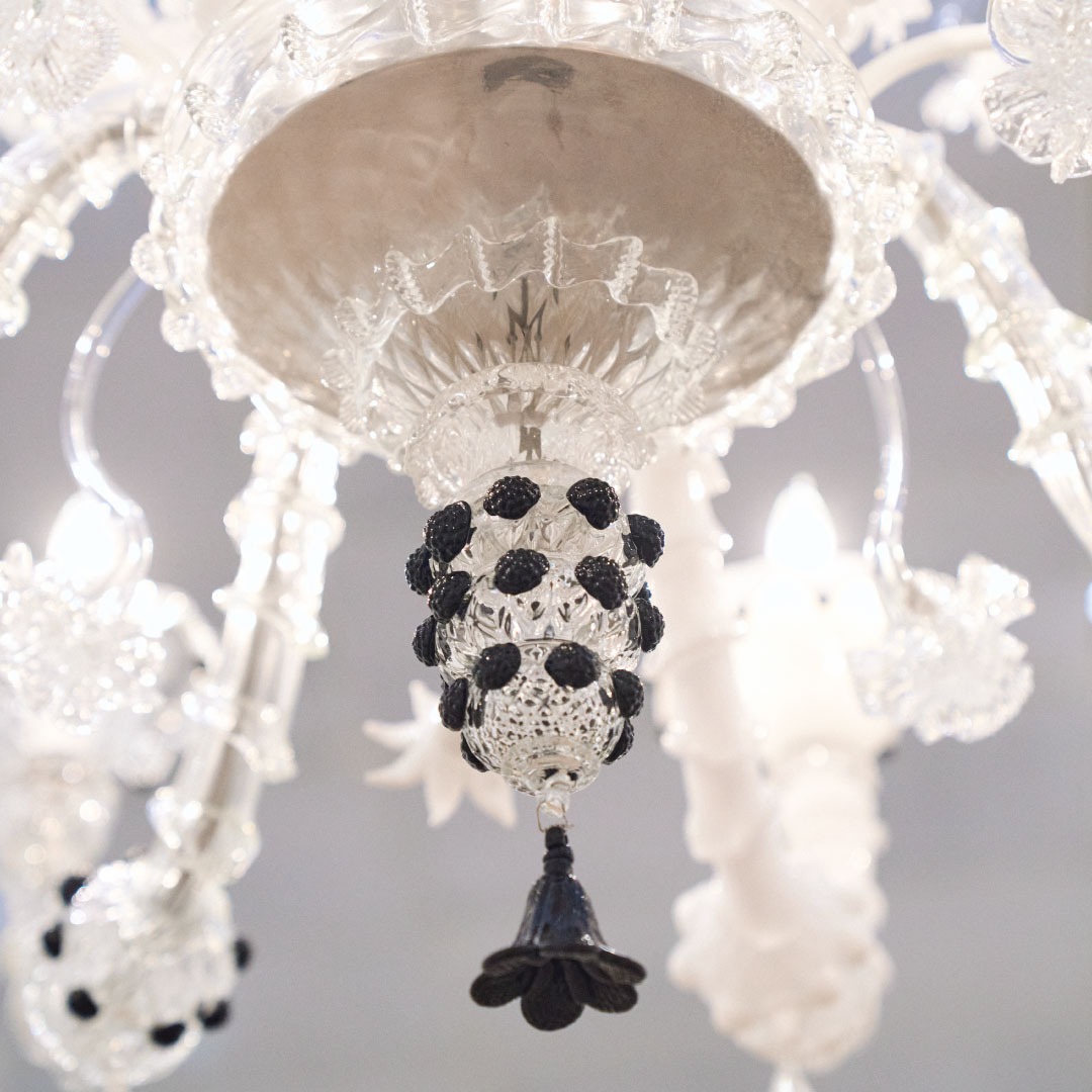 Detail of a white and black glass  chandelier. 