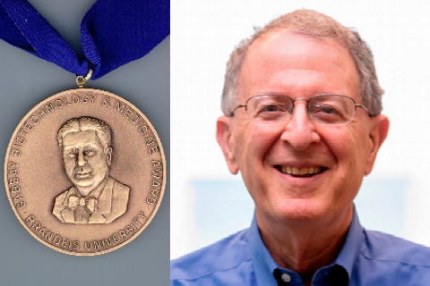 Image of Gabbay Award medal alongside award dinner Jeffrey Gordon