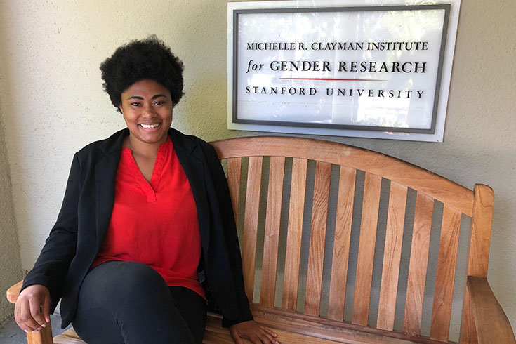 Melissa Brown sitting on a bench