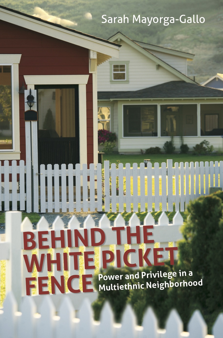 Beyond the White Picket Fence Book Cover, red house in background with white picket fence in forefront