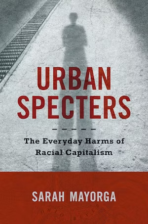 Shadow of person over a light gray background with "Urban Specters" in red text