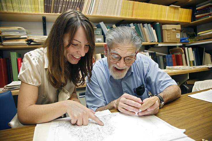 Student and faculty discussing work