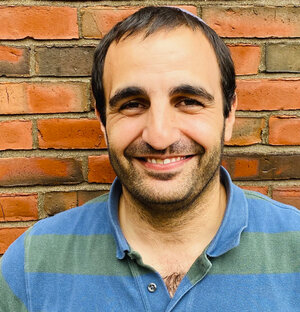 headshot of Ariel Cohen