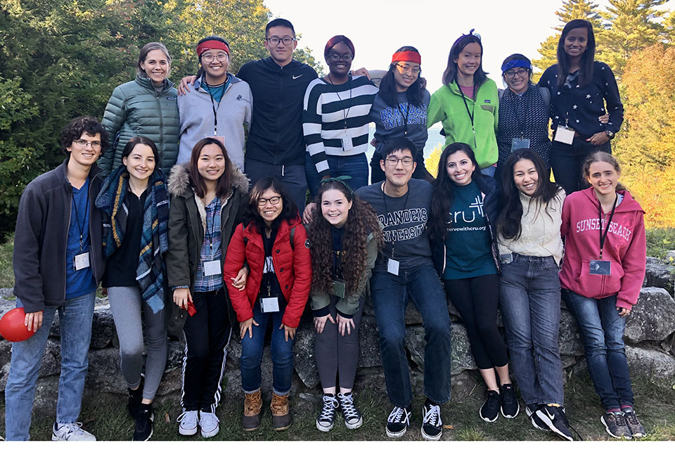 large group of students posed together outside