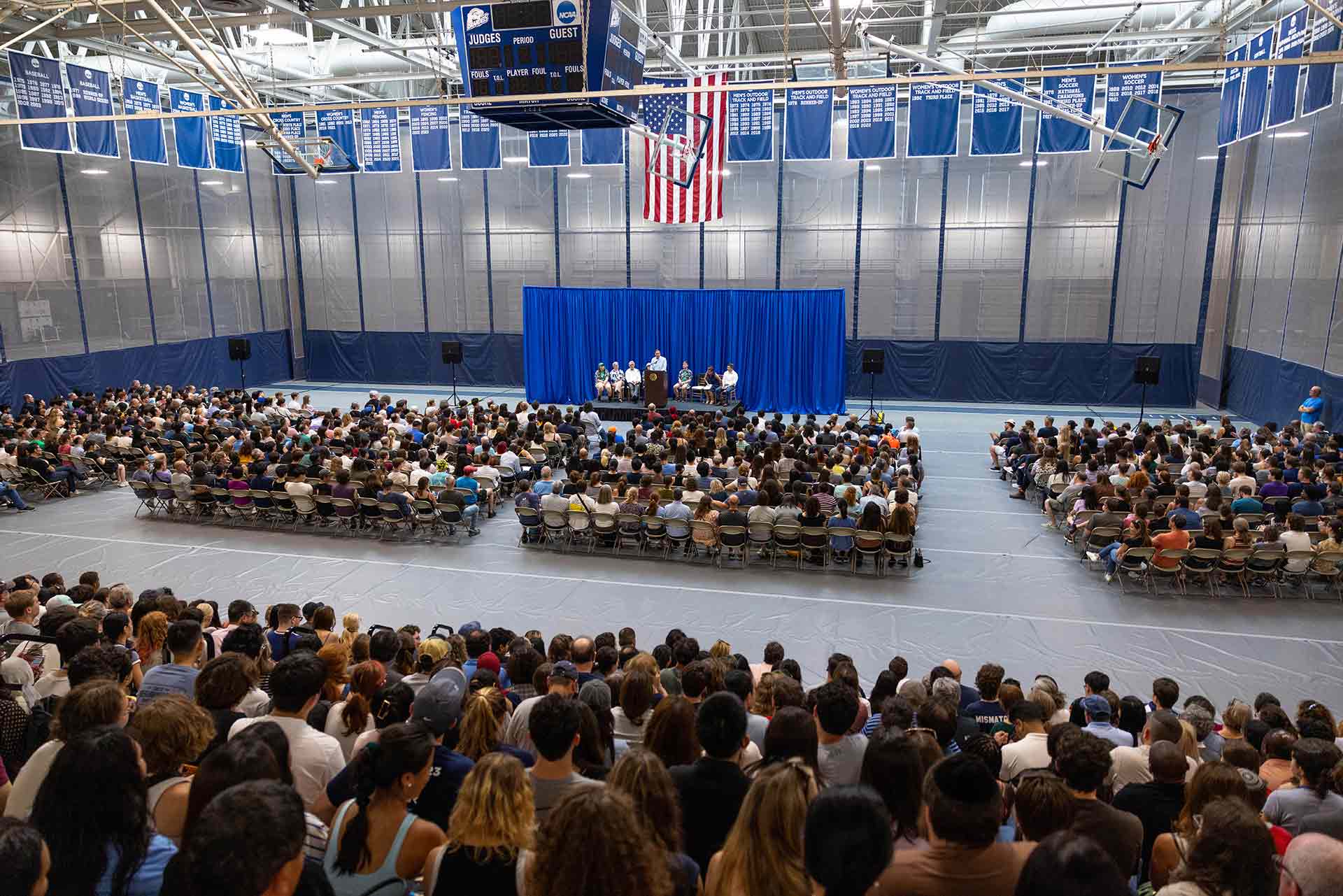 Crowds seated indoors