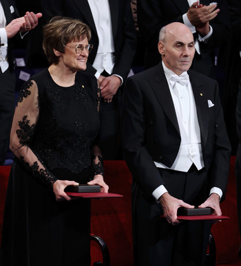 Karikó and Weissman on stage after receiving the Nobel Prize.