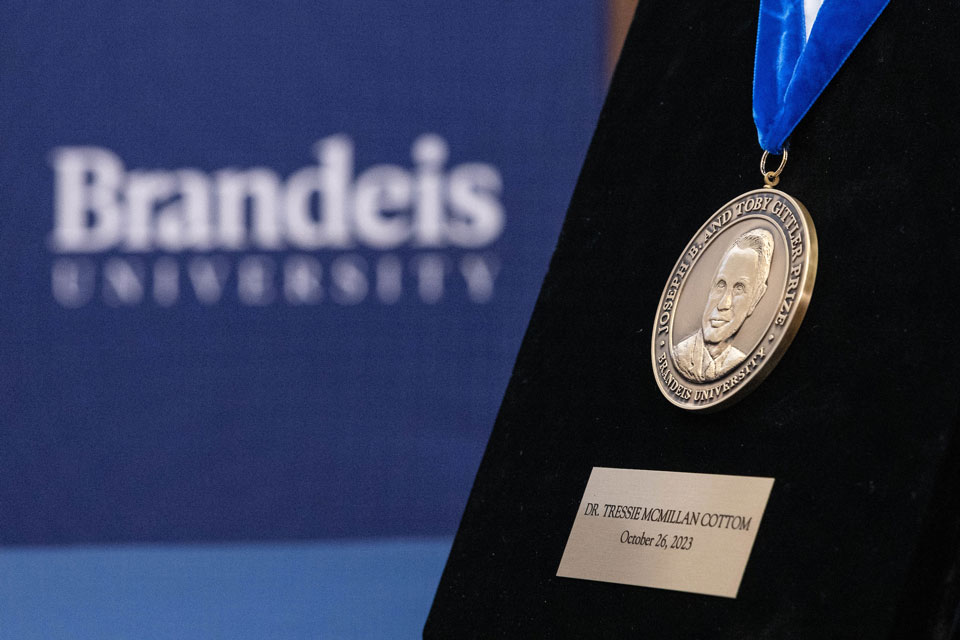 The Gittler medal on a display stand.