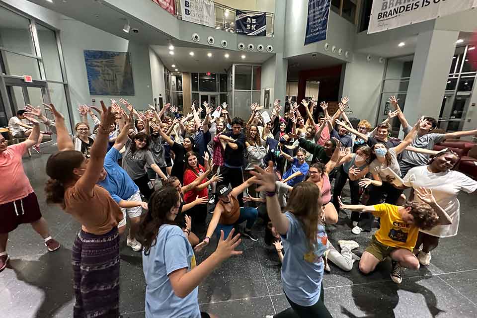 Students rehearsing in the SCC atrium