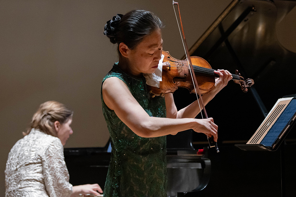 Midori plays the violin