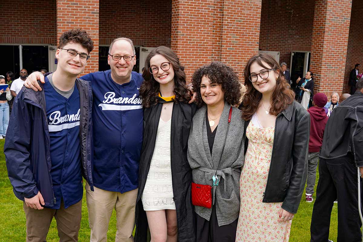 A graduate with her family