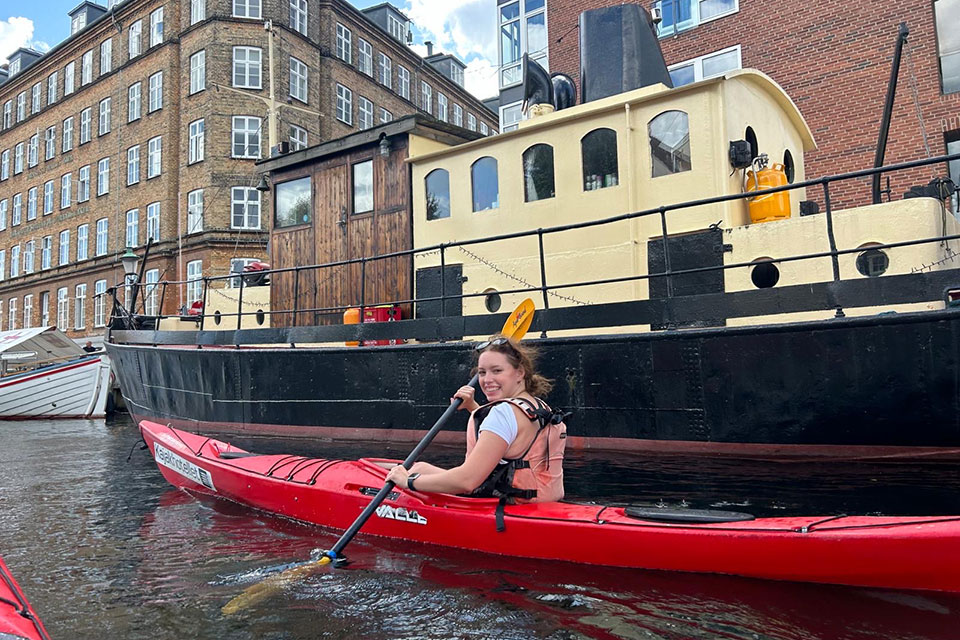 Zoe Fleischman kayaking in Copenhagen.