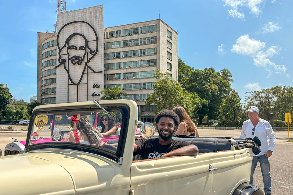 Samuel Hadego sitting in a car in Havana, Cuba