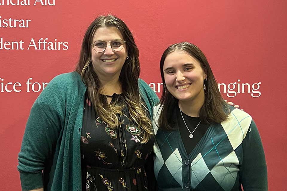 Samantha and Esther smile during a job shadowing event