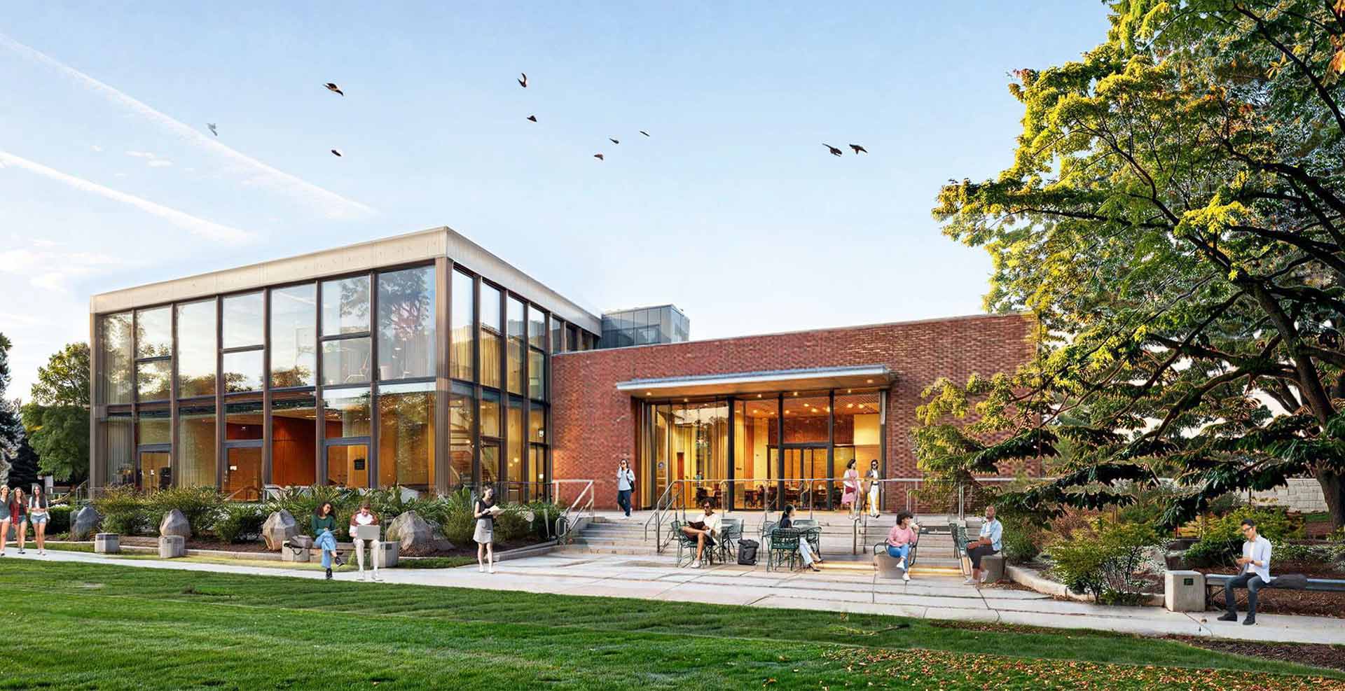Conceptual rendering of the new Center for Jewish Life. People are seen socializing outside a brick building.