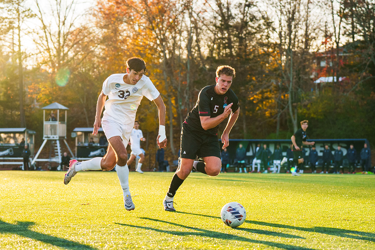 Keller C. ’27 sprints to beat a Stevens defender to the ball
