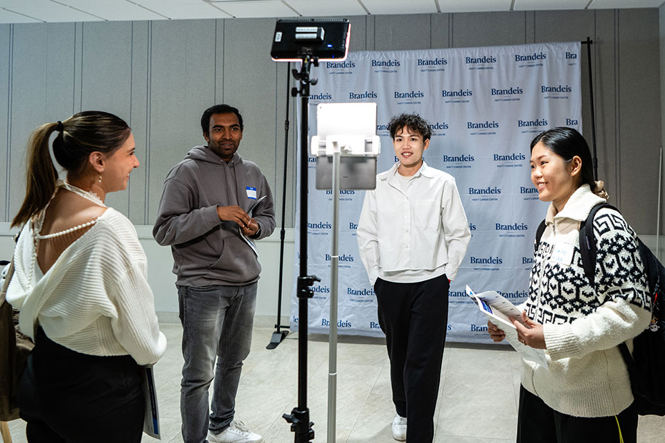 Students get their photo taken at the All-Majors Career and Internship Fair.