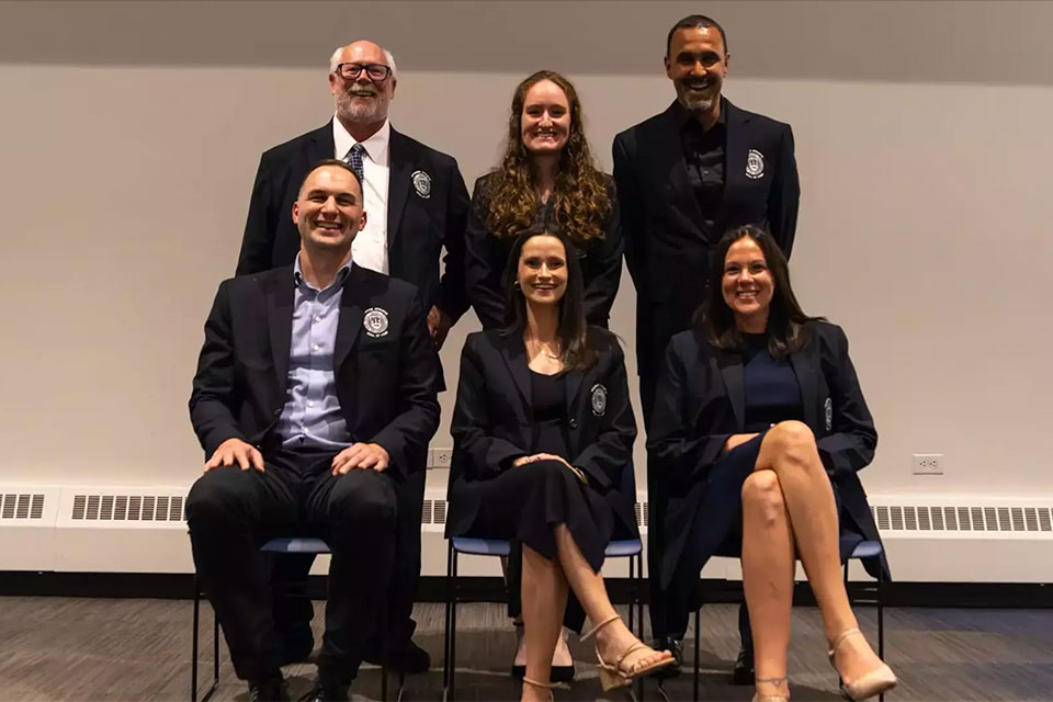 The five alumni and one assistant coach who were inducted into the Joseph M. Linsey Hall of Fame.