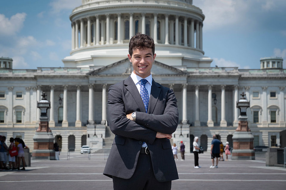 Noah Levy standing in front of the United States Capitol