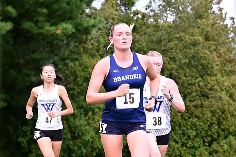 Ella Warkentine running in a cross country race.