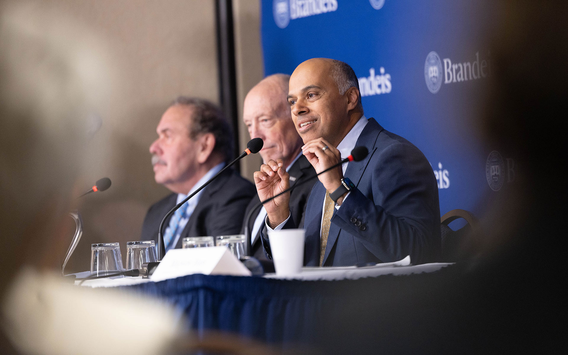 Panelists speak during a Brandeis event at the Press Club