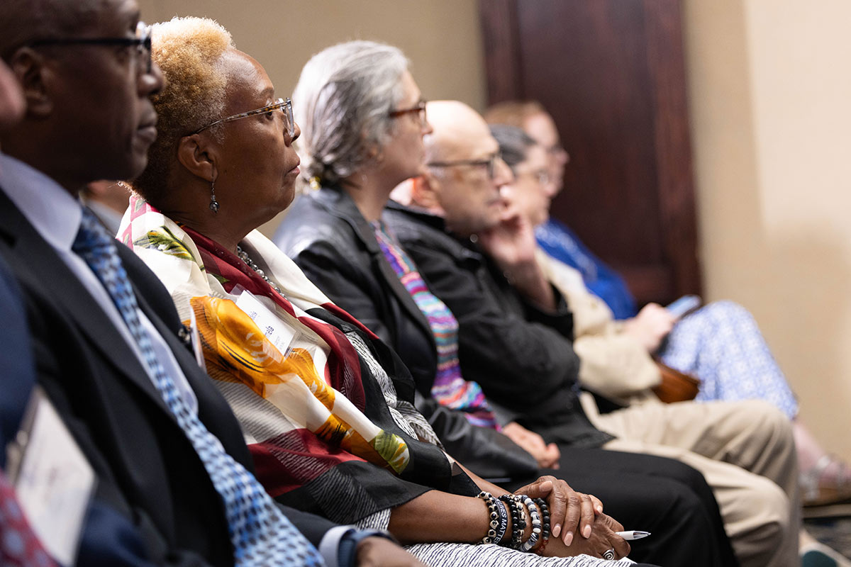 People seated and listening to the event