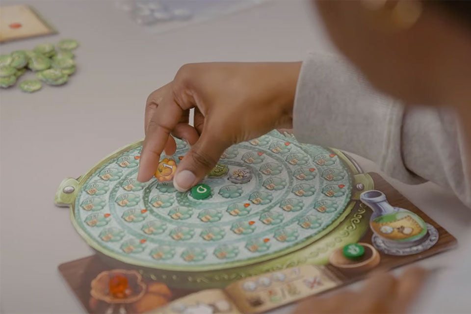 Student playing board game
