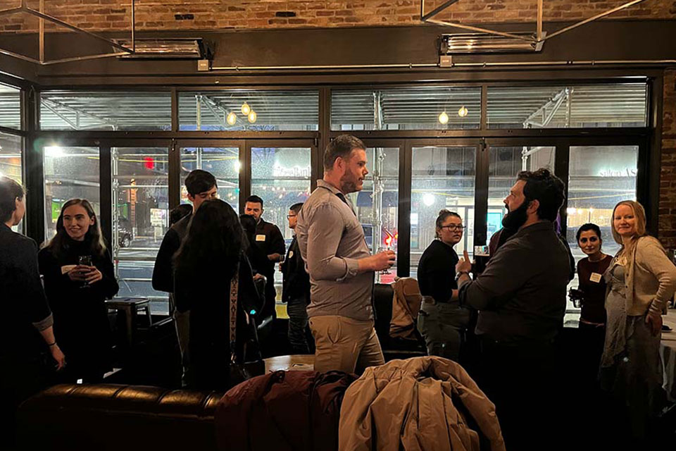 Brandeis graduate students speak at a professional development event.