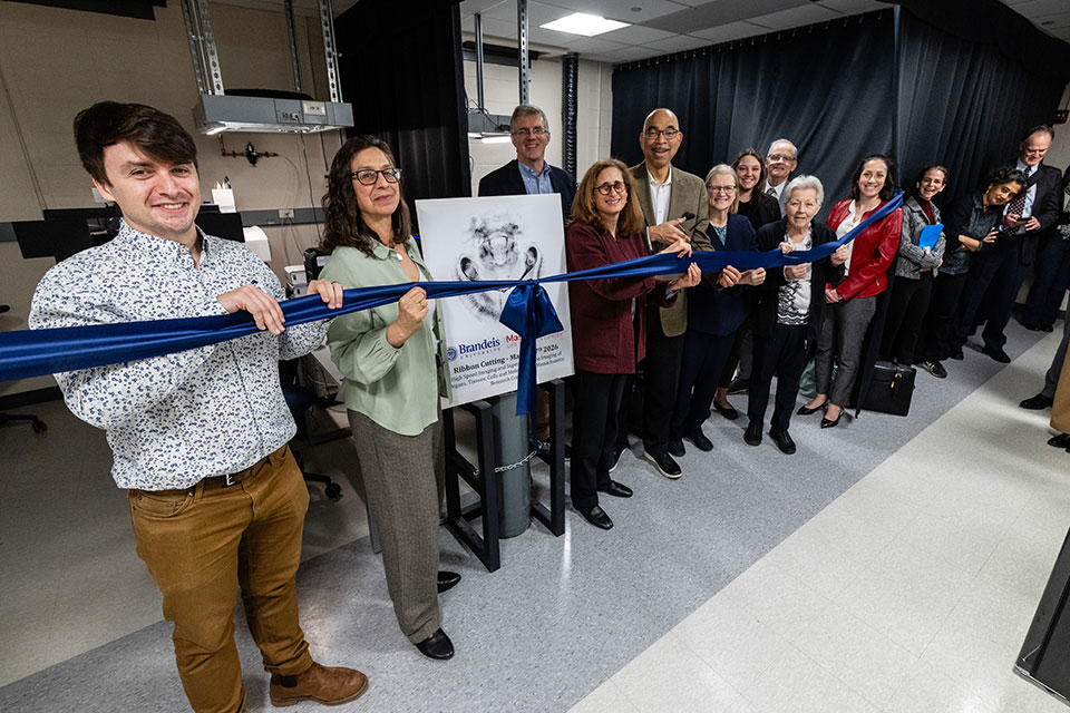 People gathered at a ribbon cutting