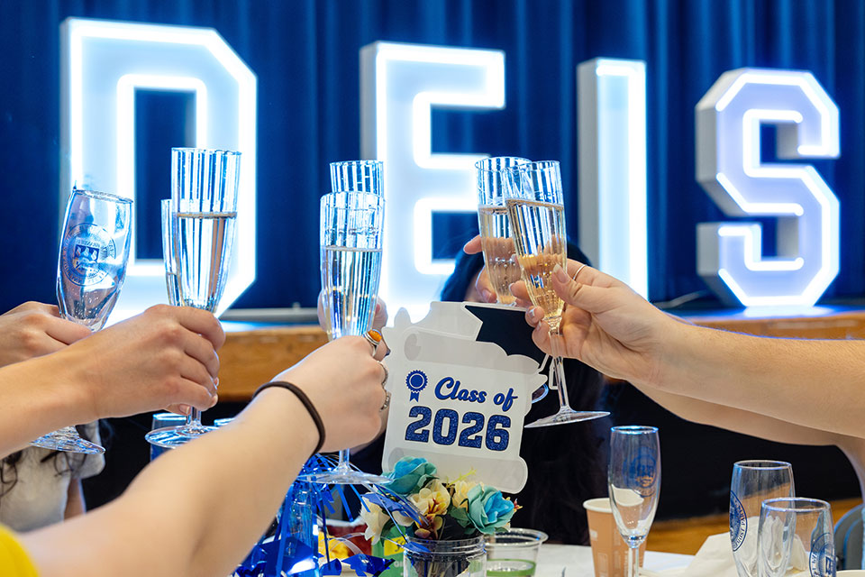 Hands cheers with glasses of champagne. 