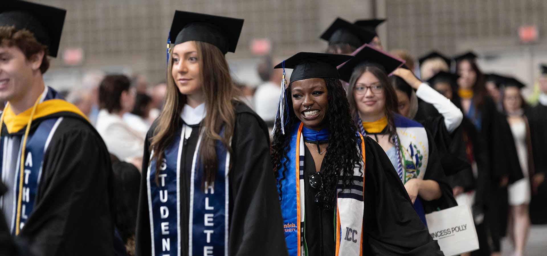 Graduates filing into the ceremony