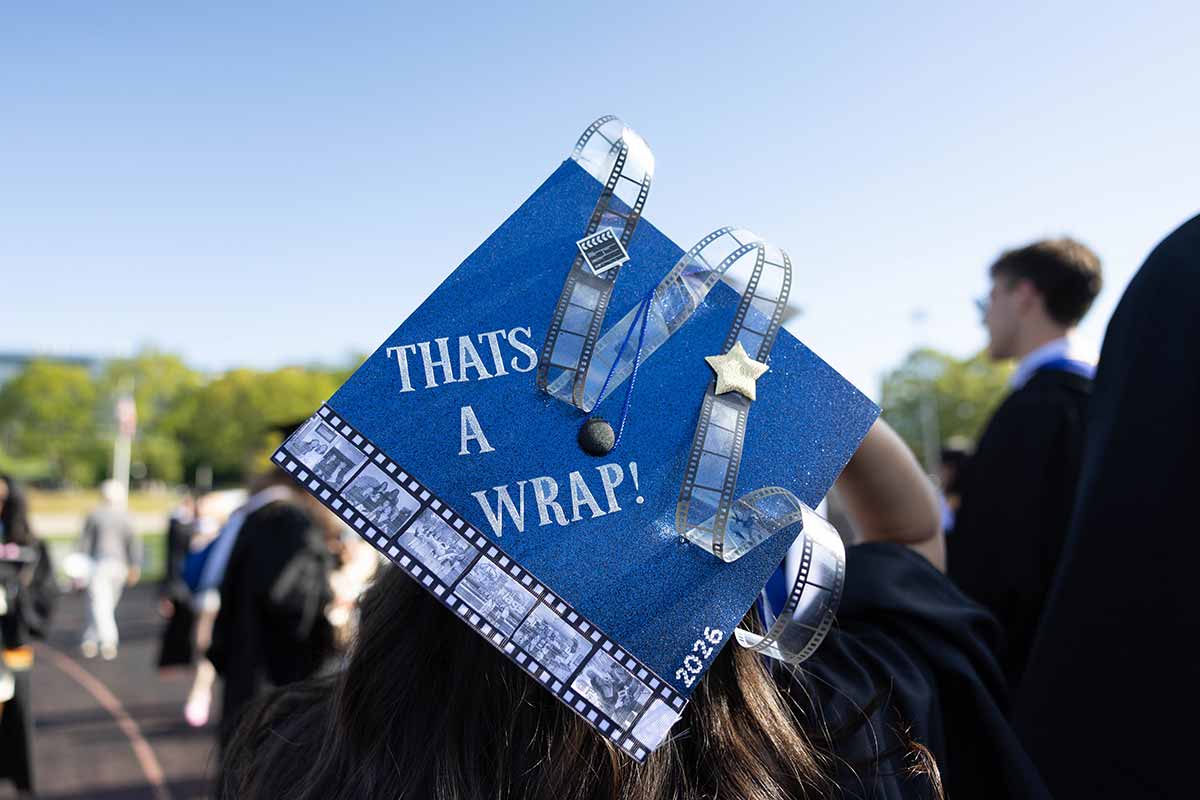 A mortarboard with a film strip, text reads: That's a wrap