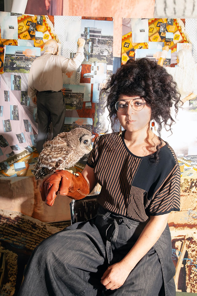 Woman holding an owl