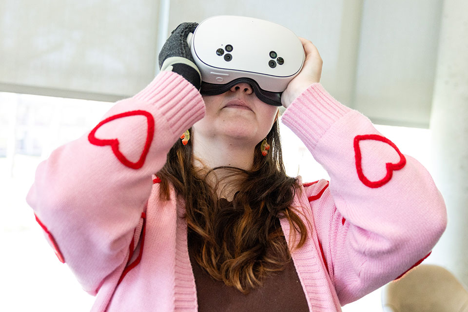 A student using a virtual reality headset.