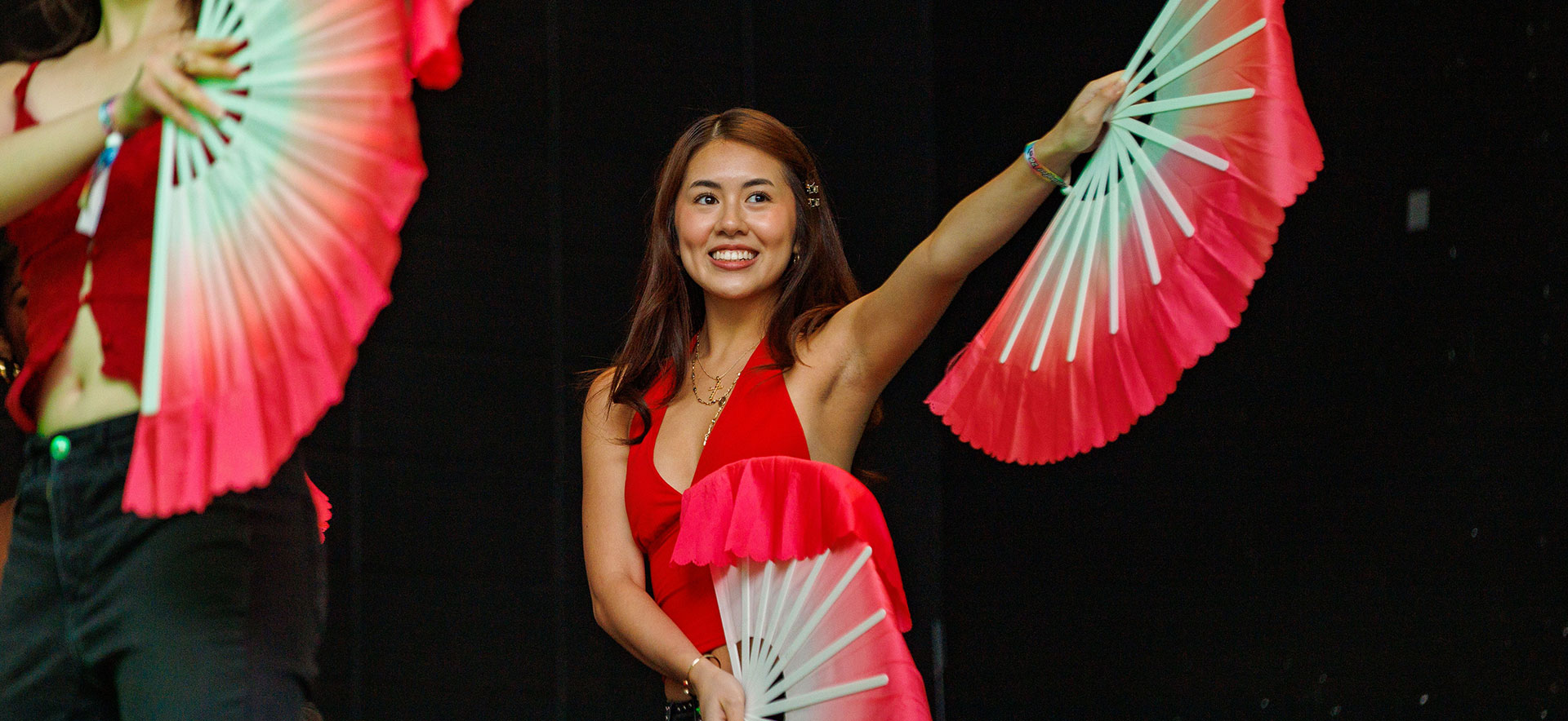 A student dances on stage during the 2026 Culture X show.