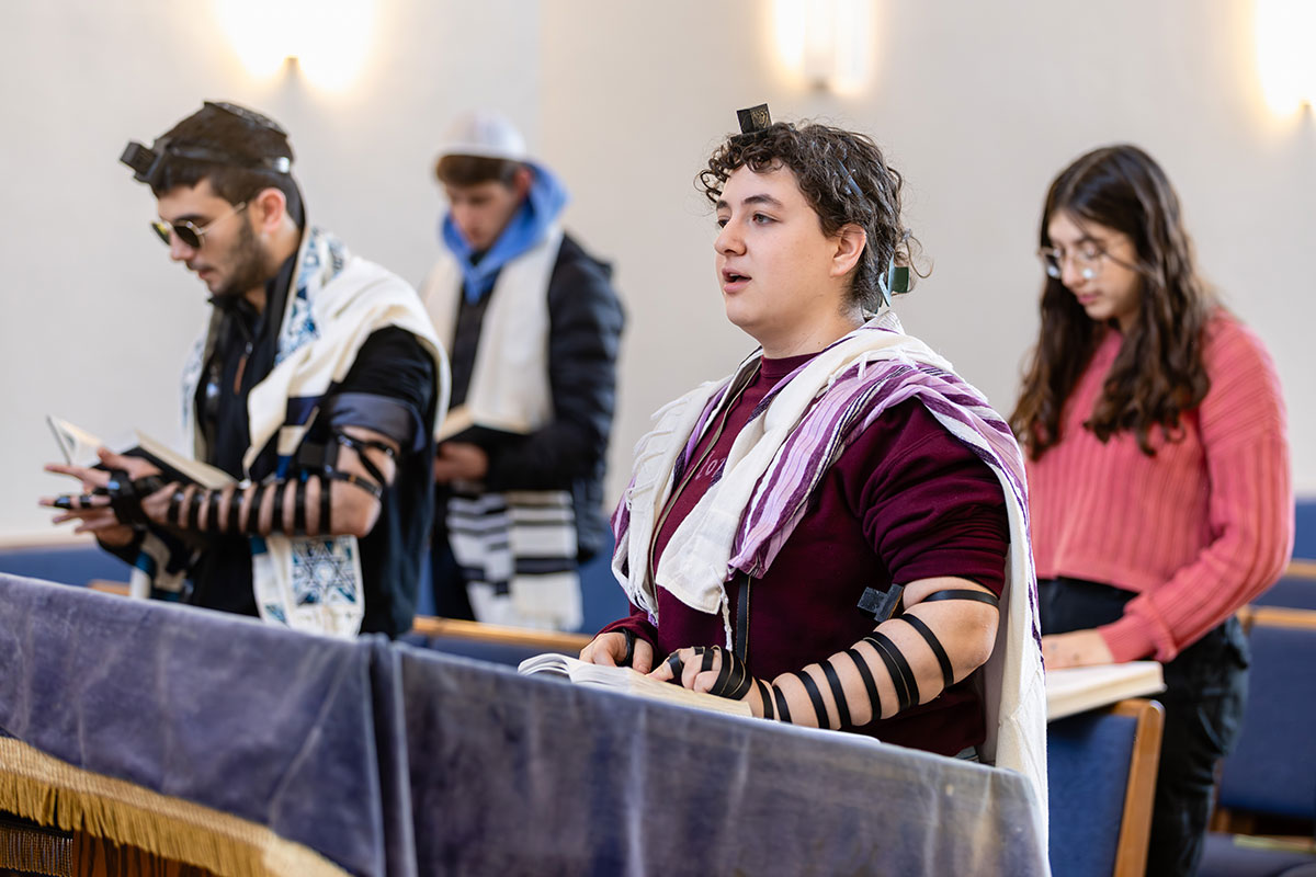 Students read the Megillah in the Berlin Chapel.