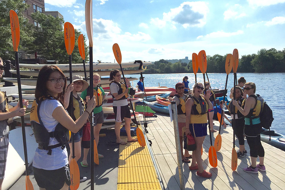 A group of students getting ready to go kayaking