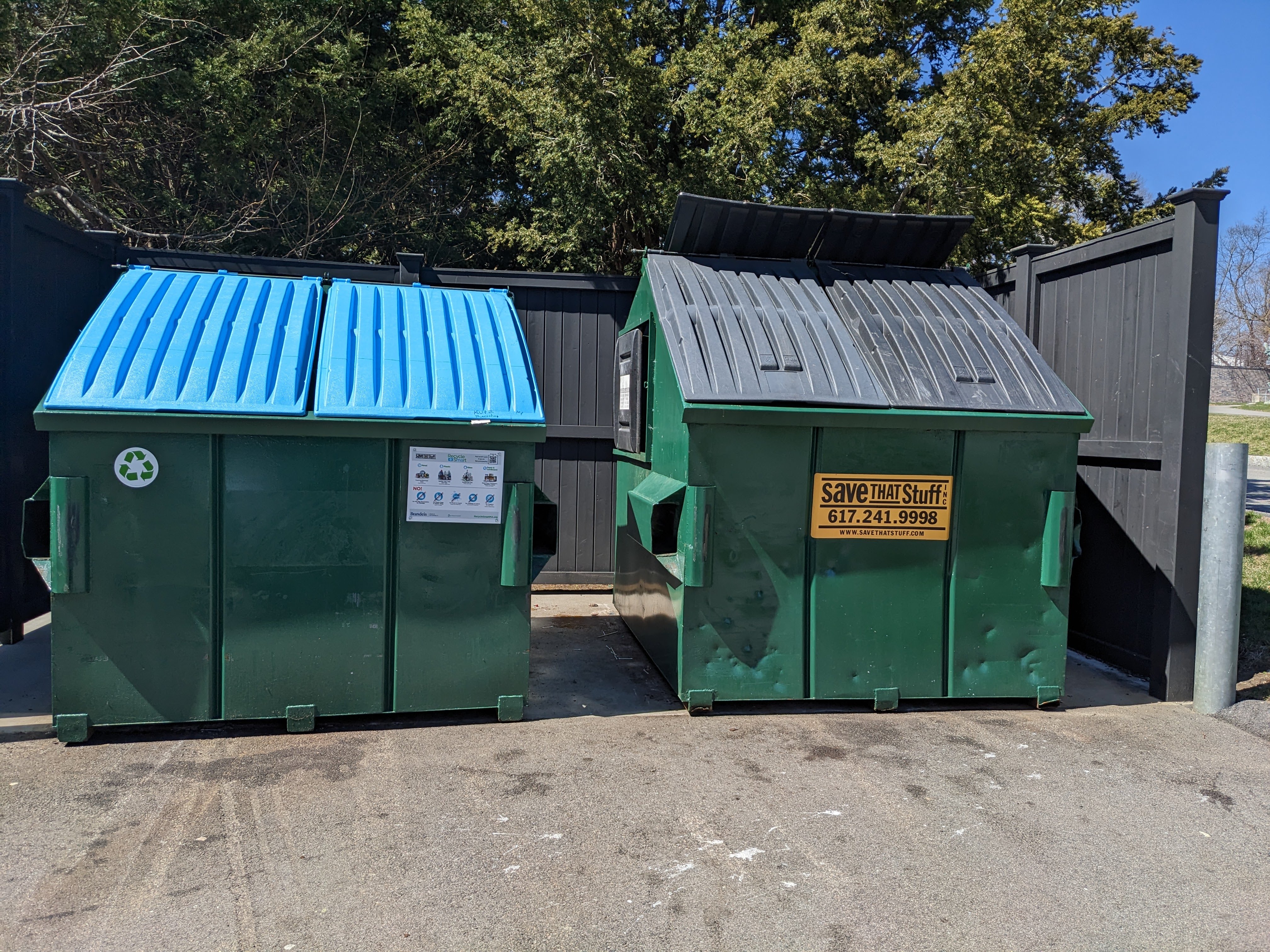 trash & recycling dumpsters outside massell