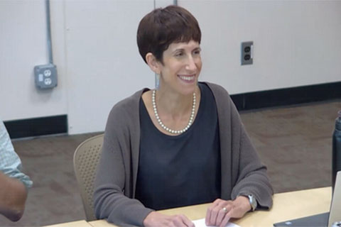 Miriam Goldstein smiling at the Jewish Studies Colloquium.