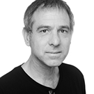 The black and white portrait photo of Ehud Krinis