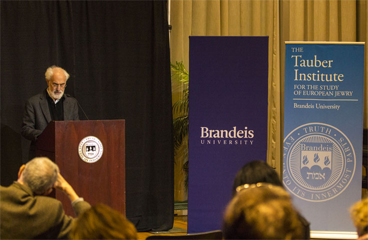 Michael Fishbane speaks at a podium