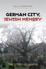 "German City, Jewish Memory: The Story of Worms" book cover with an old tree (no leaves) in a grave yard with houses in the distance.