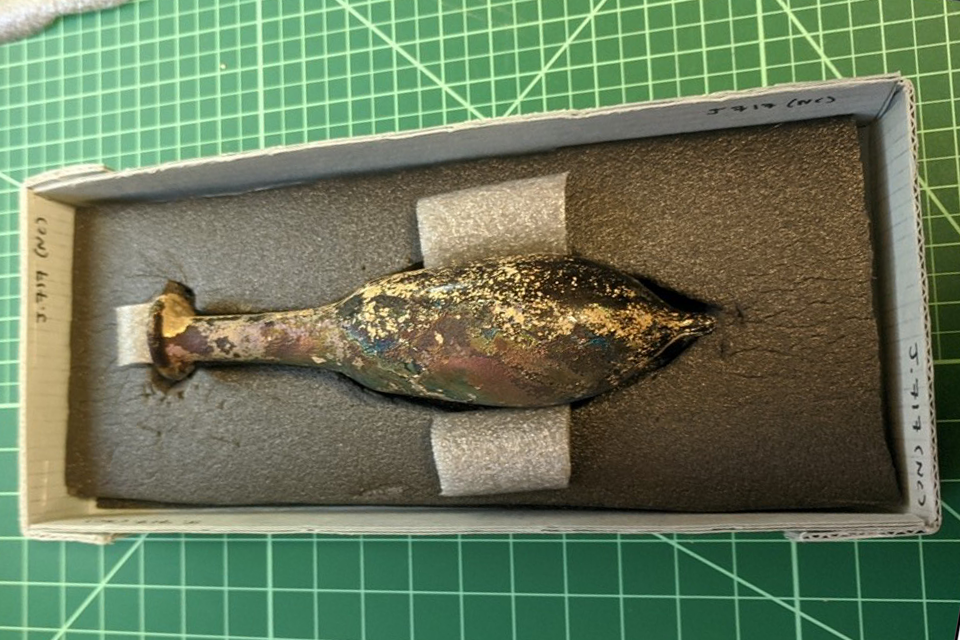 A Roman glass vessel is given a new housing as part of the CLARC interns artifact conservation project.